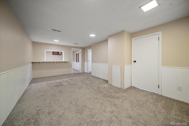 1923 S Newark Way, Aurora, CO 80014 - carpeted spare room with a wainscoted wall