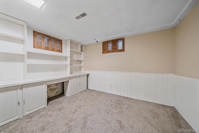 1923 S Newark Way, Aurora, CO 80014 - unfurnished office with carpet flooring, wainscoting, and a textured ceiling