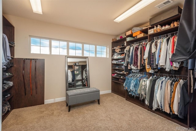 walk in closet with carpet floors and visible vents