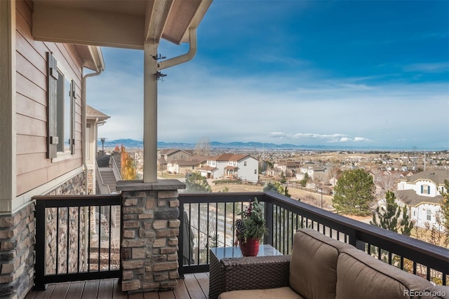 balcony with a mountain view and a residential view