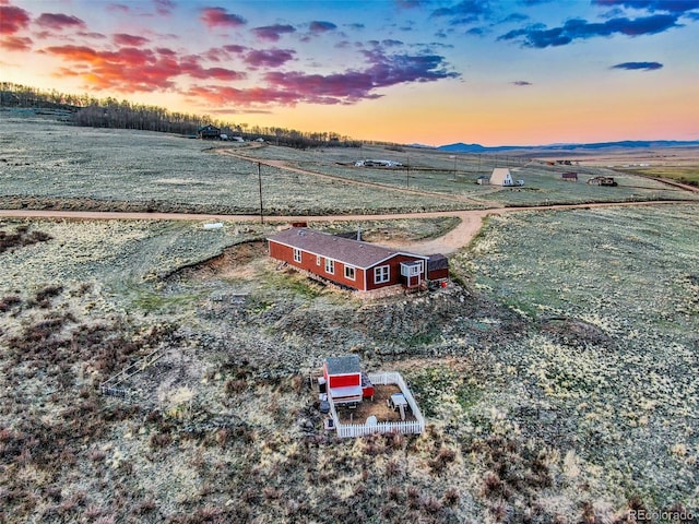 aerial view at dusk with a rural view