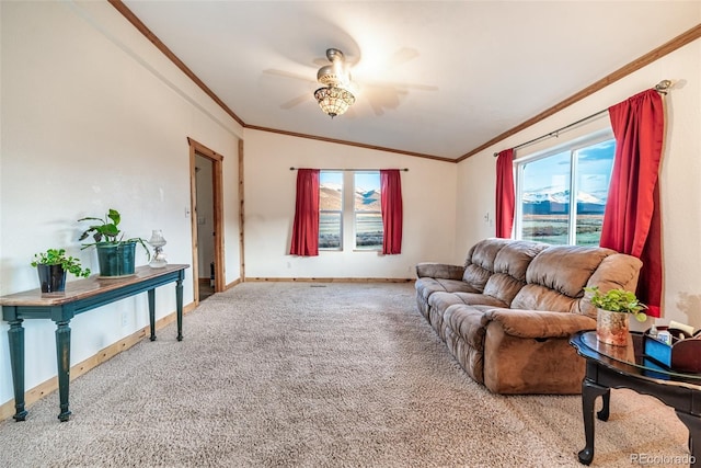 living area with a wealth of natural light, carpet flooring, and crown molding