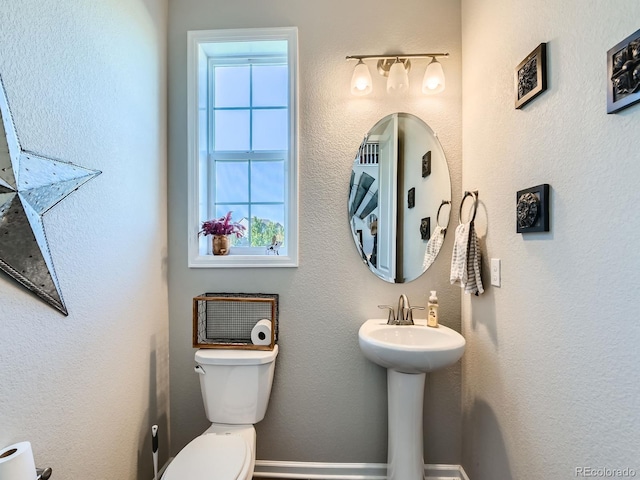607 Azalea St, Brighton, CO 80601 - bathroom featuring toilet