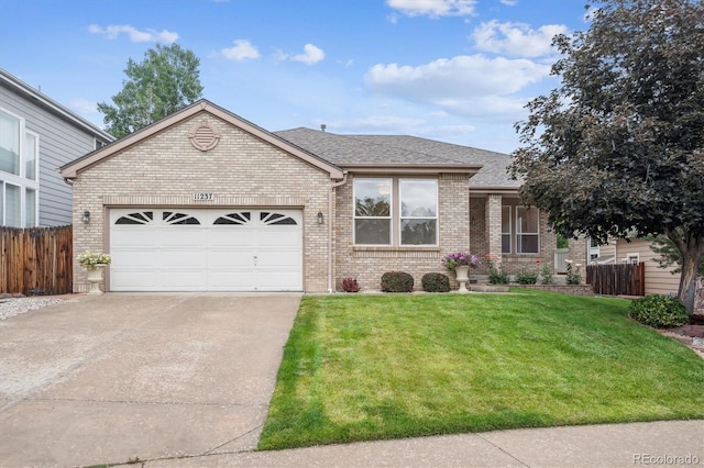 11237 W Ford Dr, Lakewood, CO 80226 - ranch-style home with brick siding, driveway, a garage, and a shingled roof