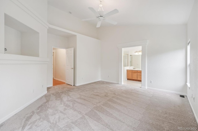 11237 W Ford Dr, Lakewood, CO 80226 - spare room featuring light colored carpet and ceiling fan