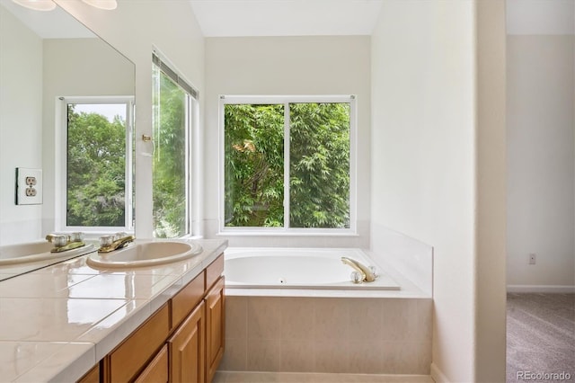 11237 W Ford Dr, Lakewood, CO 80226 - full bath featuring a whirlpool tub and vanity