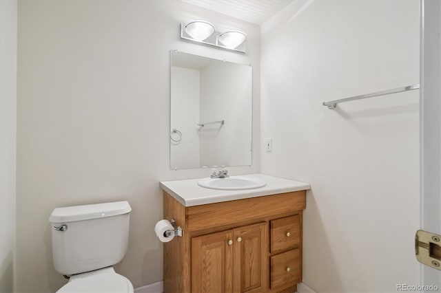 11237 W Ford Dr, Lakewood, CO 80226 - half bathroom with vanity and toilet