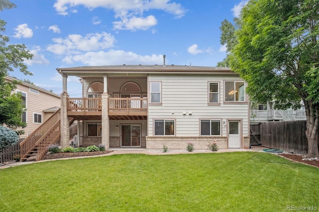 11237 W Ford Dr, Lakewood, CO 80226 - rear view of house featuring brick siding, a balcony, and stairway