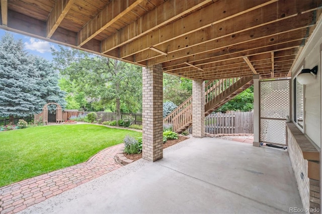 11237 W Ford Dr, Lakewood, CO 80226 - fenced backyard featuring stairway and a patio