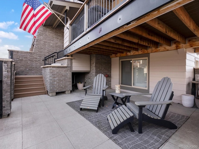 view of patio featuring stairway