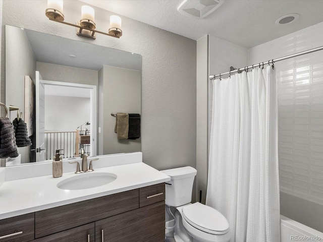 full bath with visible vents, a textured wall, toilet, shower / tub combo with curtain, and vanity