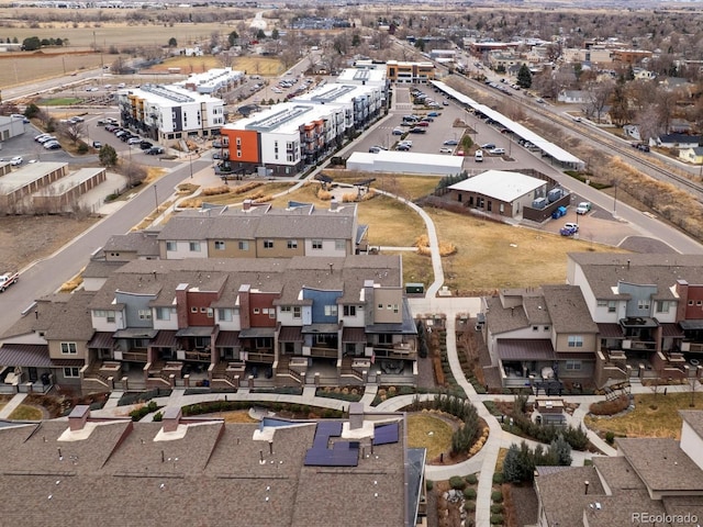 birds eye view of property with a residential view