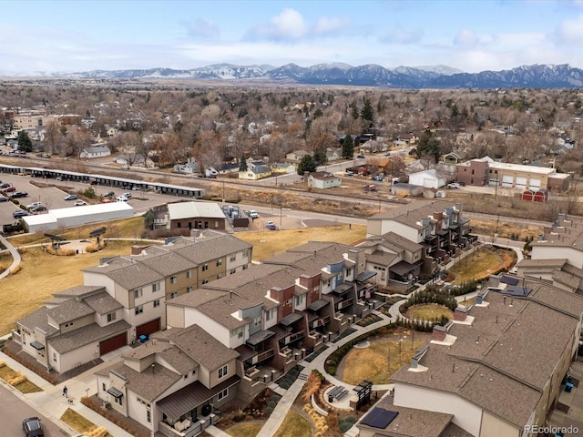 birds eye view of property with a residential view and a mountain view