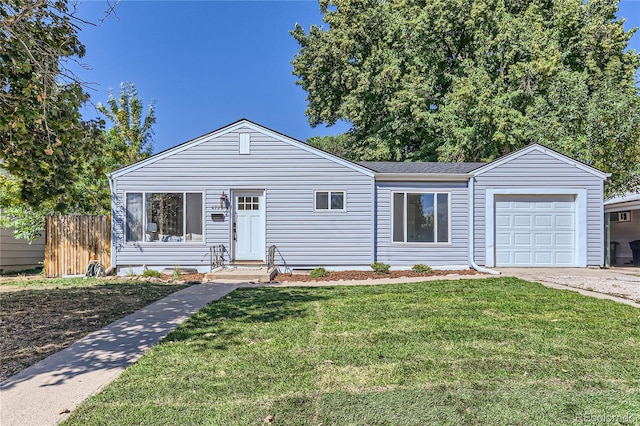 ranch-style home featuring a garage and a front yard