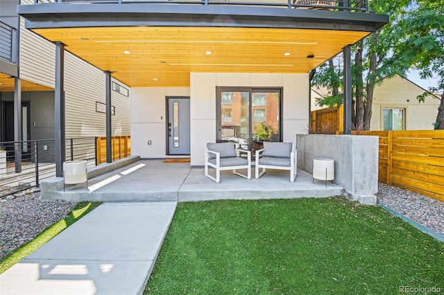 exterior space with fence and a patio area