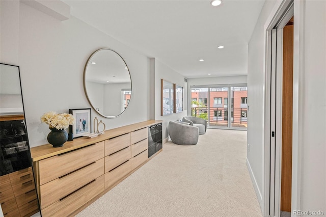 carpeted bedroom featuring access to outside, recessed lighting, and baseboards