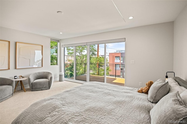 bedroom featuring recessed lighting, carpet floors, and access to outside