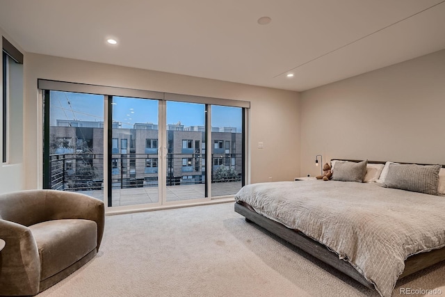 carpeted bedroom featuring recessed lighting and access to outside