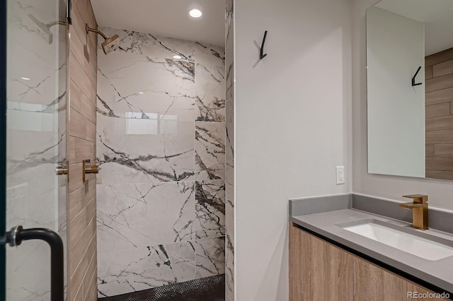 3232 W 16th Ave, Denver, CO 80204 - full bathroom with a marble finish shower, vanity, and recessed lighting