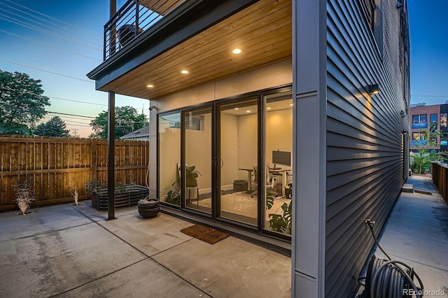 3232 W 16th Ave, Denver, CO 80204 - patio terrace at dusk featuring a patio