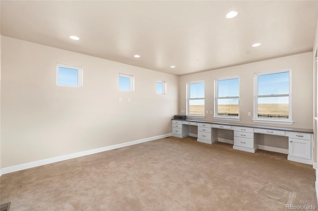 7172 S Oakleaf St, Bennett, CO 80102 - unfurnished office with built in study area, recessed lighting, light colored carpet, and baseboards
