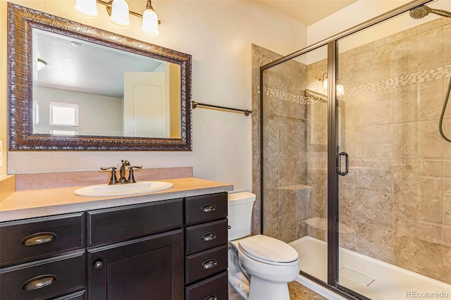 7172 S Oakleaf St, Bennett, CO 80102 - full bath with vanity, a shower stall, and toilet