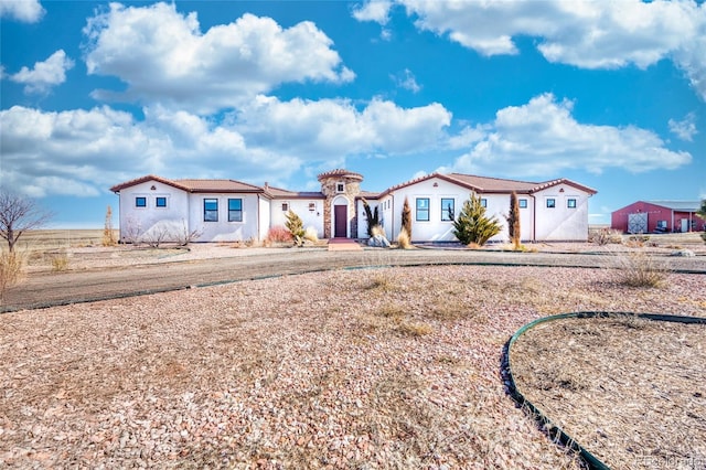 7172 S Oakleaf St, Bennett, CO 80102 - mediterranean / spanish-style house featuring stucco siding and a tiled roof