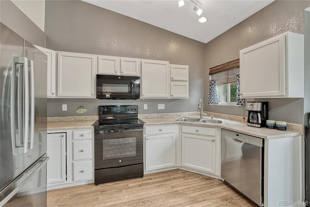 21789 Farmingdale Way, Parker, CO 80138 - kitchen featuring black appliances, a textured wall, light wood finished floors, white cabinets, and light countertops