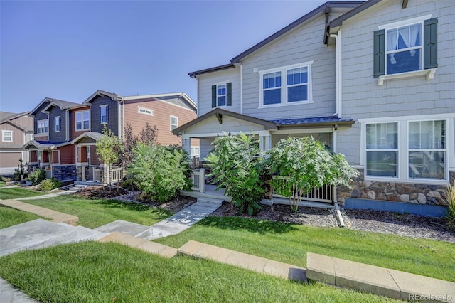 view of front of house featuring a front lawn