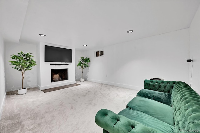 unfurnished living room featuring carpet