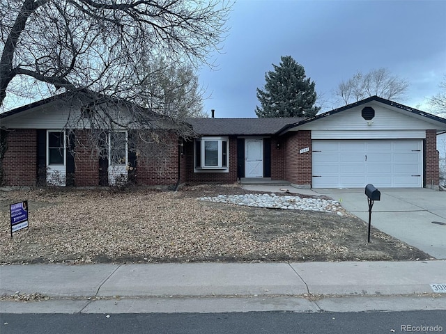 single story home featuring a garage