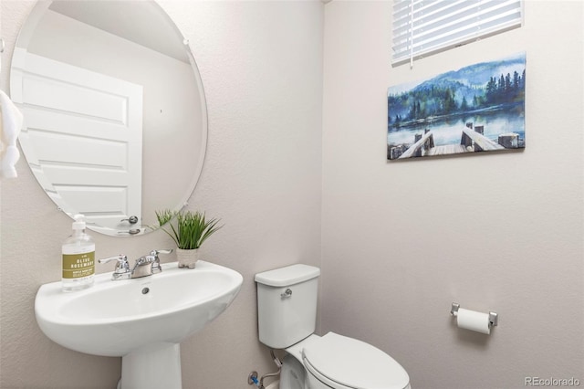 9284 Gore St Unit A, Arvada, CO 80007 - half bath featuring toilet and a sink