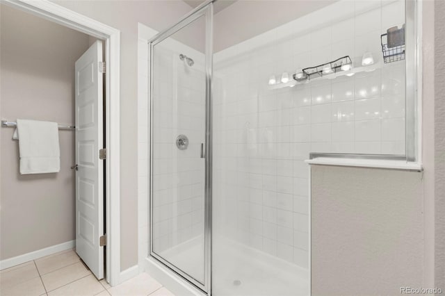 9284 Gore St Unit A, Arvada, CO 80007 - full bathroom featuring a tile shower and tile patterned floors