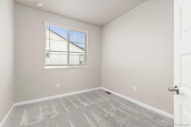 9284 Gore St Unit A, Arvada, CO 80007 - carpeted spare room featuring a smoke detector and baseboards