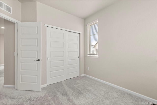 9284 Gore St Unit A, Arvada, CO 80007 - unfurnished bedroom featuring carpet flooring and a closet
