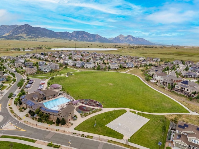 9284 Gore St Unit A, Arvada, CO 80007 - aerial perspective of suburban area with a mountain backdrop and a pool area