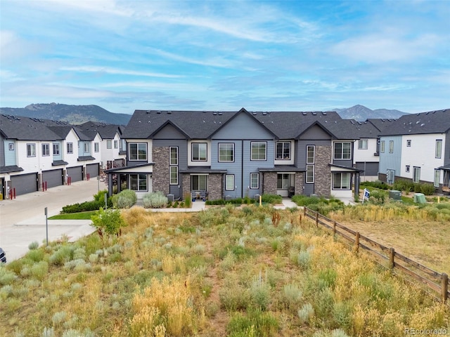 9284 Gore St Unit A, Arvada, CO 80007 - view of front facade with a residential view and a mountain view