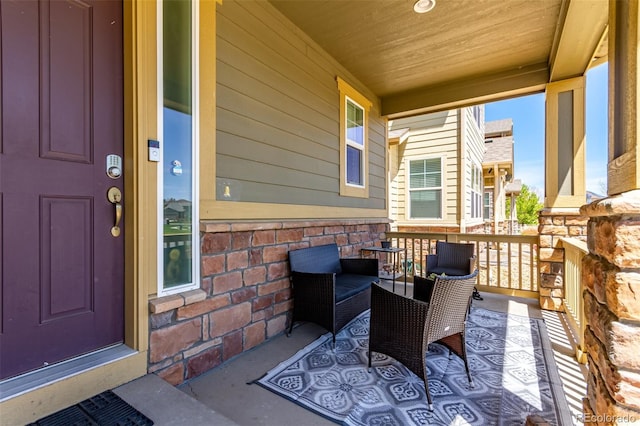 entrance to property featuring a porch