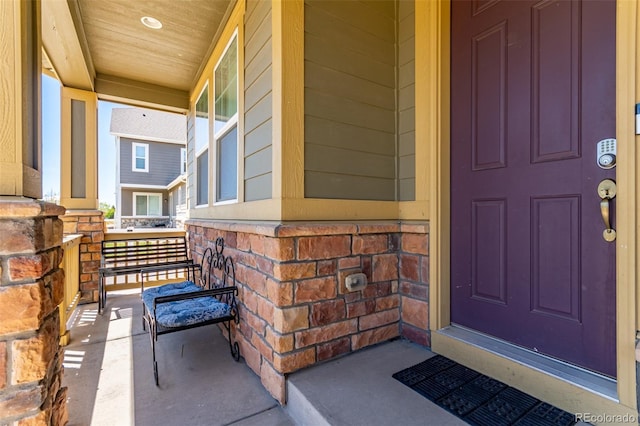 doorway to property with a porch