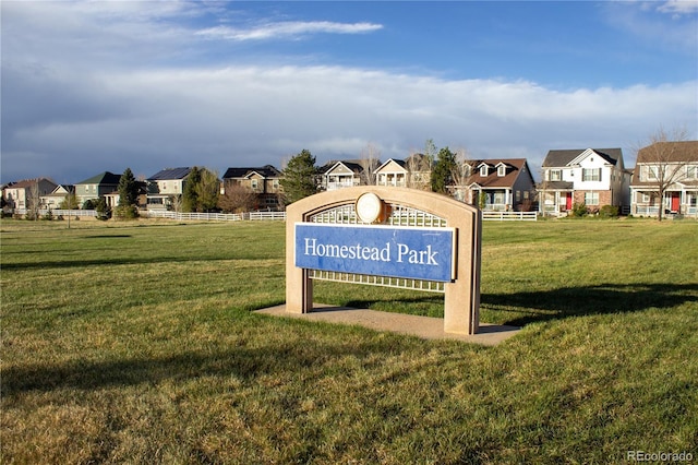 community sign with a residential view