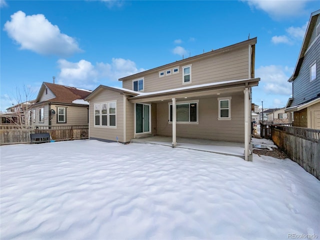 view of snow covered property