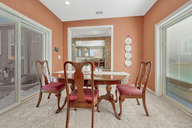 view of carpeted dining room