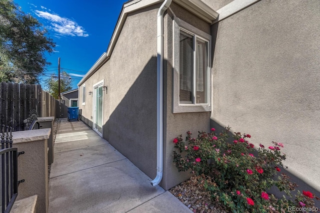 view of property exterior featuring a patio area