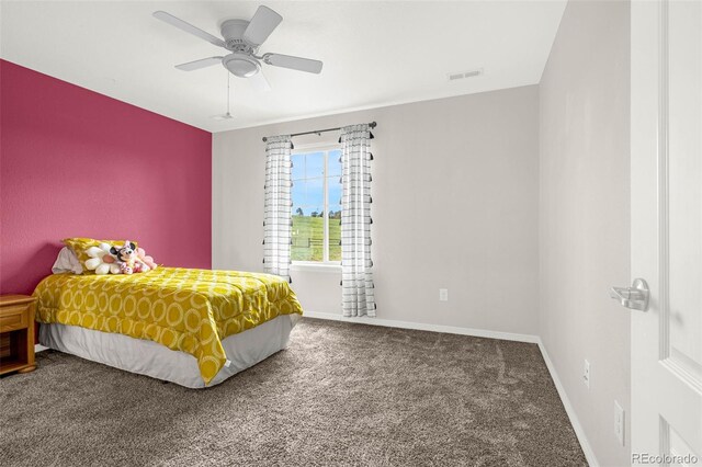 3434 Antelope Ridge Trl, Parker, CO 80138 - bedroom with carpet, baseboards, and ceiling fan