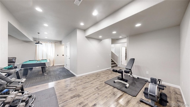 exercise area featuring pool table and wood-type flooring