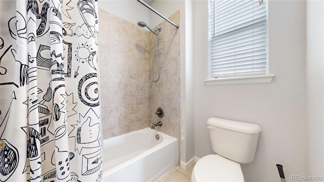 bathroom with shower / bath combination with curtain, tile patterned floors, and toilet