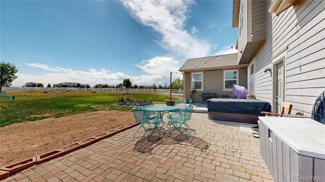 view of patio with a hot tub