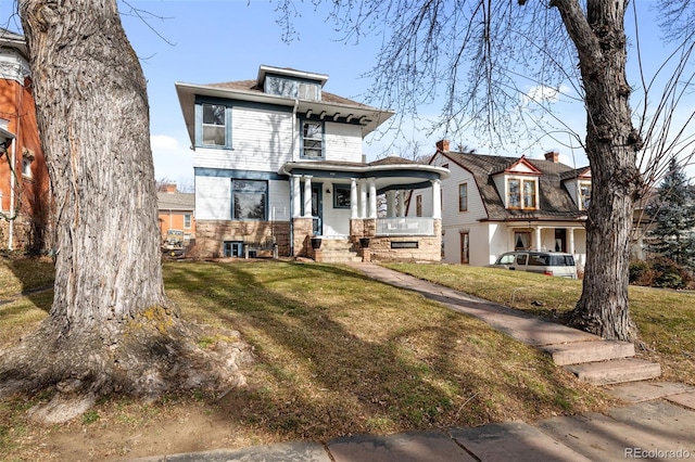 613 Pine St, Boulder, CO 80302 - traditional style home featuring covered porch and a front yard