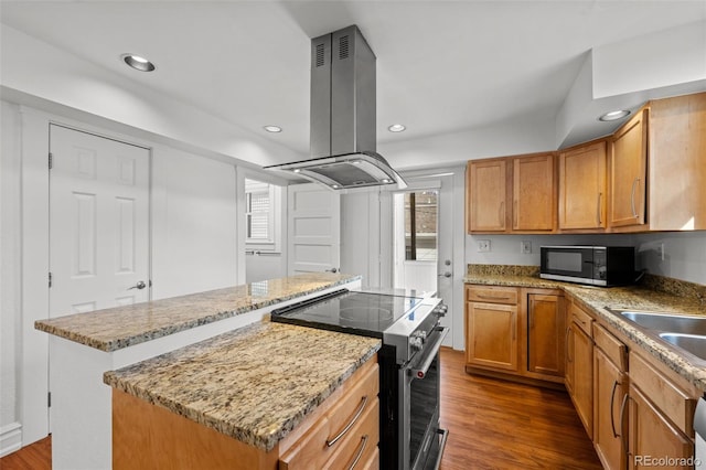613 Pine St, Boulder, CO 80302 - kitchen with a kitchen island, dark wood-type flooring, black microwave, island exhaust hood, and high end stainless steel range oven