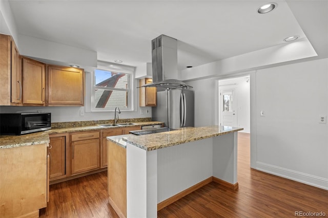 613 Pine St, Boulder, CO 80302 - kitchen with a center island, black microwave, freestanding refrigerator, island range hood, and a sink